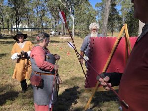 Photo of collecting arrows from a target.